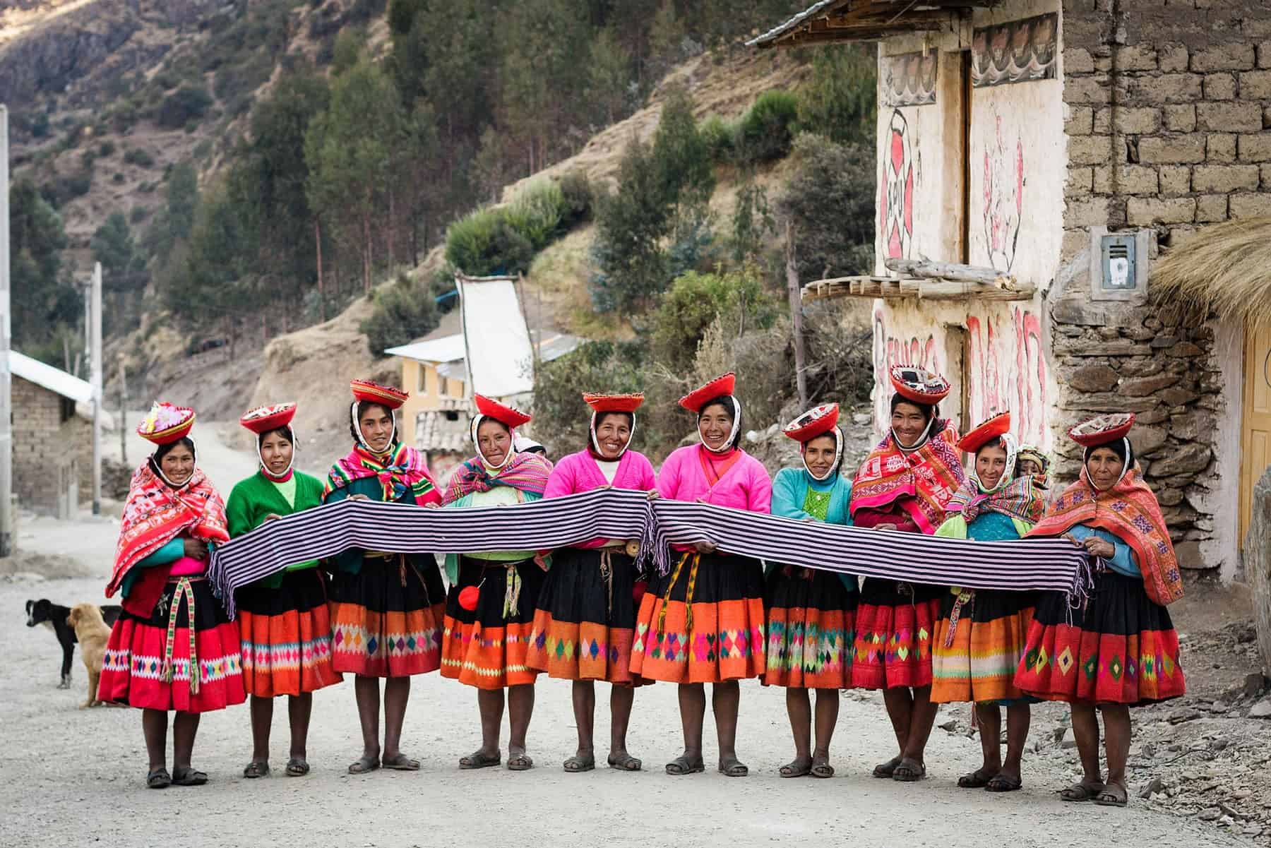 andean woman showing their handicrafts