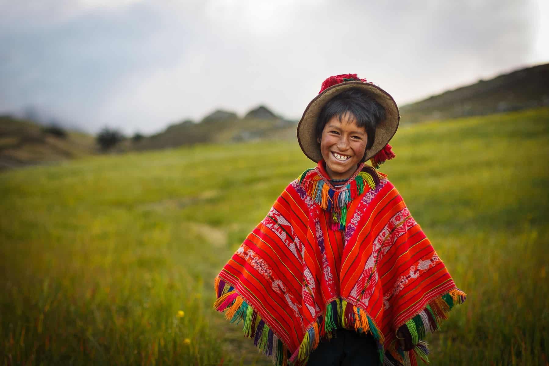 andean boy in peru wtih traditional clothes